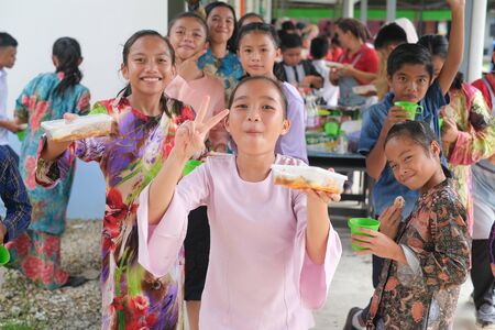 KOTA KINABALU, SABAH, MALAYSIA  - Jun 17, 2019: Students, from different etnics celebrating festive season together.のeditorial素材