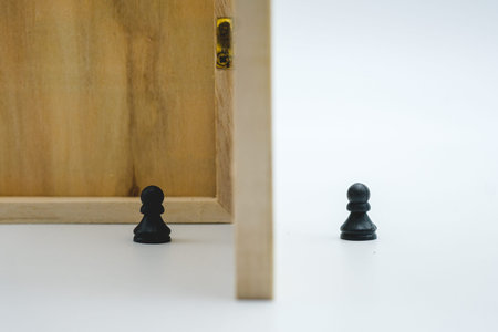 Covid19 pandemic, conceptual shoot stay at home and social distancing using chess set.の写真素材