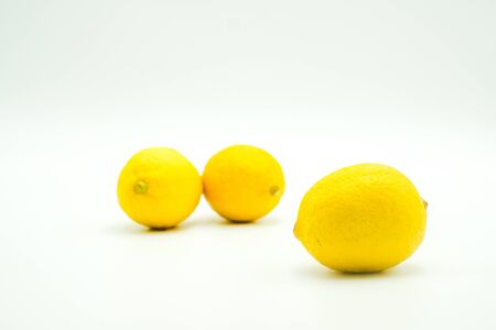 Fresh lemons shot on a white isolated background.の写真素材