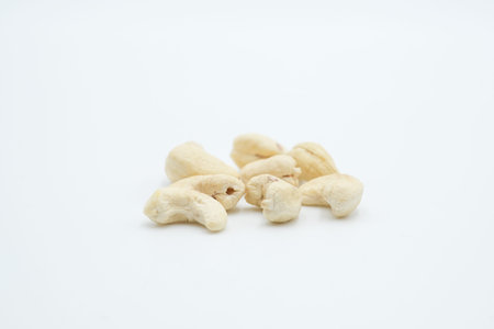 Cashew nut shot on a white isolated background.