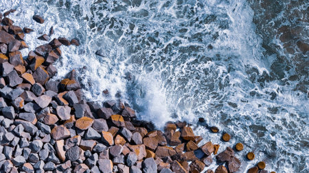Waves on the sea wallの写真素材