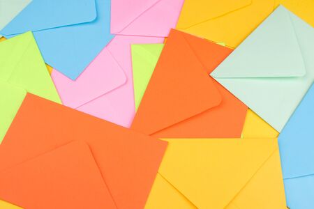 Background from multi-colored mailing envelopes. mail or delivery conceptの写真素材