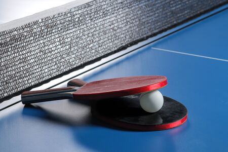 table tennis Accessories for table tennis racket and ball on a blue tennis table. Sport. Sport game.の写真素材