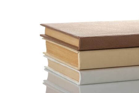 Stack of books on a white isolated background. Old books. Education. school. studyの写真素材
