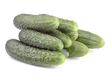 Fresh green cucumbers on white isolated background. Fresh vegetables.の写真素材