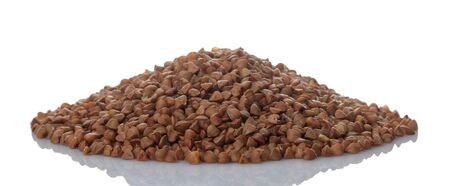 Buckwheat groats heap on white isolated background. porridge. healthy food. cereals.の写真素材