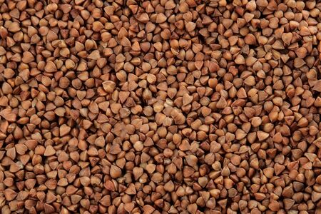 Background of buckwheat closeup. cereals. healthy food. porridge. place for inscription.の写真素材