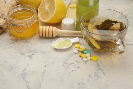 Various medicines for flu and cold remedies on a white wooden table .. Cold. diseases. cold. flu.の写真素材