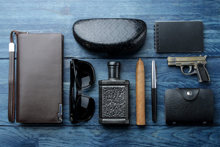 Men's Accessories.men's style. Glasses, perfume, wallet, notebook, cigar and business card holder on...