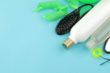 hair cosmetics and hair accessories, hair curlers, combs, barrettes and elastic bands. on a bright...