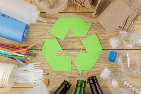 Eco symbol. recycling. eco concept on natural wooden table. waste recycling. view from above.