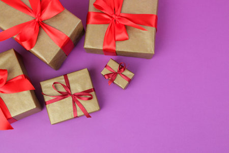 Gift boxes. Gifts on a bright purple background. Holidays. Valentine's Day. women's day. mother's...