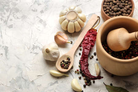 herbs and spices. various seasonings, herbs and spices on a light concrete background.の写真素材