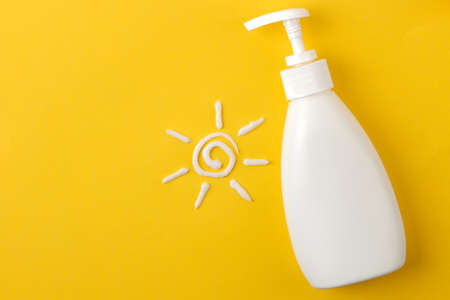 sunscreen remedy. various sunscreens and sun cream on a bright yellow background. Sun protection. Ultraviolet protection. Summer top view.の写真素材