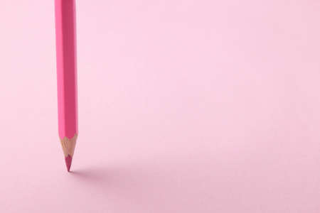 composition with pink pencil on a bright trendy pink background. top view. space for textの写真素材