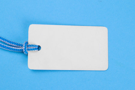 Black Friday. The concept of shopping. sale.White price tag sale on a blue background. view from...