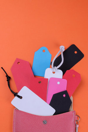 Black Friday. The concept of shopping. sale. Price tag sale on an orange background. view from above