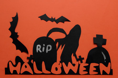 Halloween holiday. Composition with different halloween paper figures. view from above. on orange backgroundの写真素材