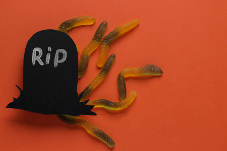 Halloween holiday. Composition with different halloween paper figures. view from above. on orange...