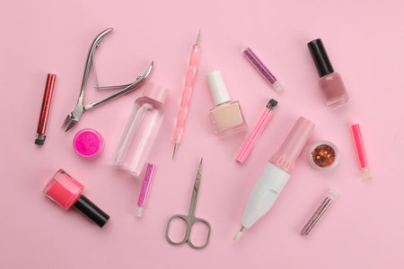 Various tools and things for manicure and pedicure on a pink background. view from above. nail care.の写真素材