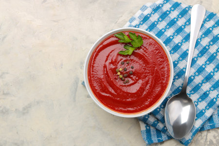 Delicious, fresh tomato soup with spices, top view.の写真素材