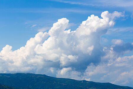 Clouds and mountain in the blue sky,Cumulusの写真素材