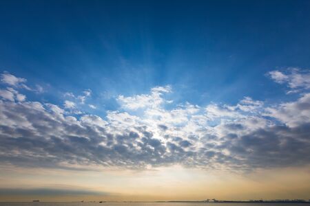 Rays from the sky, sea and cloudsの写真素材