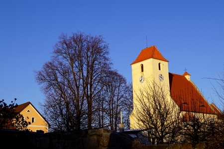 Church and tree silhouette - Zumberk, South Bohemiaの写真素材