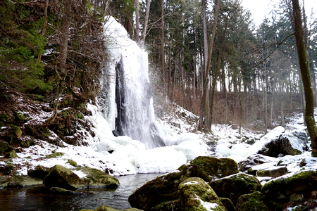Winter waterfall and boulders - Tercino udoli, Nove Hrady, South Bohemiaの写真素材