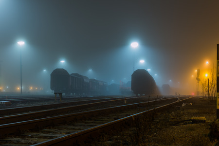 Freight cars in fogの写真素材