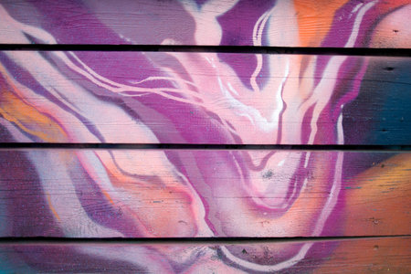 Lilac and orange stains on wooden boards, background