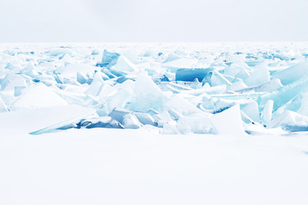 Hummocks under the snow on the ice of Lake Baikalの写真素材
