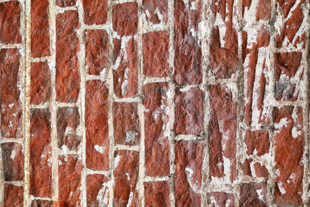 Brick old wall with knocked down facade