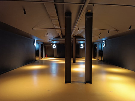 Empty cinema foyer with movie room numbersの写真素材
