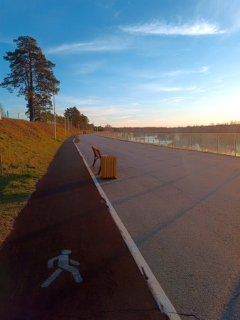 The embankment of the river on a sunny bright dayの写真素材