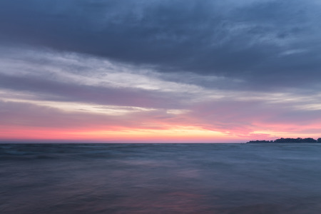 black dawn-savage beach / lonely beach in the early autumnの写真素材