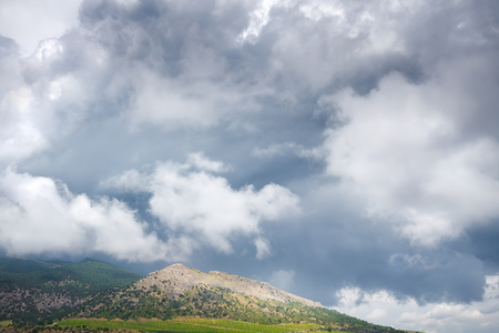 clouds over the mountain tops / bright daytime landscape Crimeaの写真素材