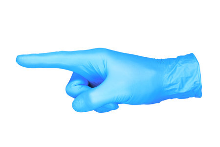 photo hand isolated glove pointing gesture / hand in direction pointing position