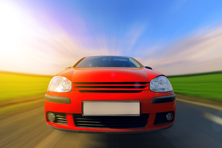car in motion / driving speed blurred backgroundの写真素材