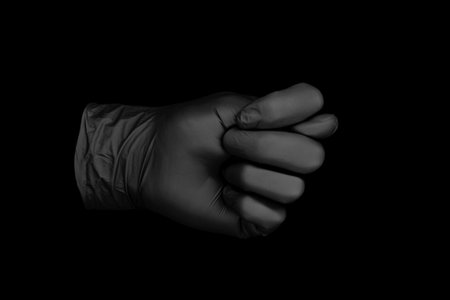black glove on black background / abstract photo background image