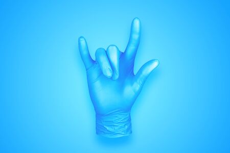 rubber glove isolated on background / abstract background photoの写真素材
