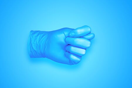 rubber glove isolated on background / abstract background photoの写真素材
