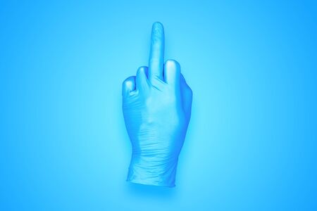 rubber glove isolated on background / abstract background photoの写真素材