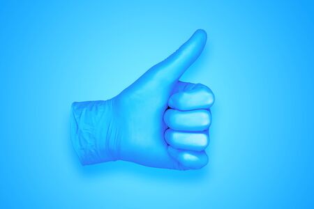rubber glove isolated on background / abstract background photoの写真素材