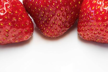 strawberry berries on a plate / ripe strawberry fruitの写真素材