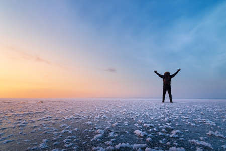 man meets the dawn / nature gives us sunrises and sunsets that you can watch foreverの写真素材