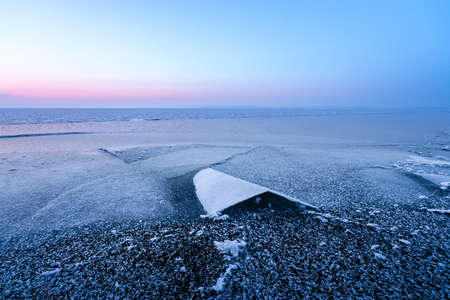 a bright winter morning landscape, soft removable warming sun rays heatの写真素材