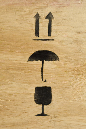 Black ink of pictogram of packing cash-box in woodの写真素材