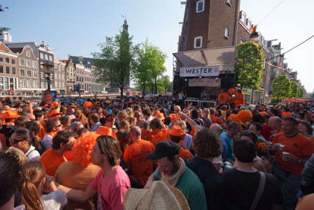 crowd in the streets of amsterdam - queensdayのeditorial素材