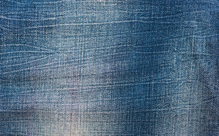 Jeans texture with light and dark blue spots